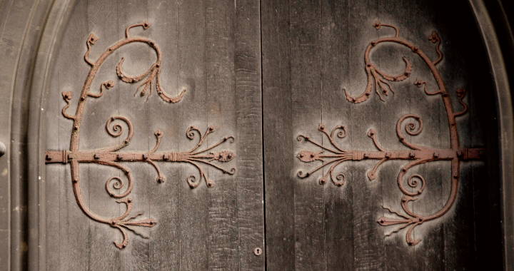 Ironwork on doors, St. Mary Magdalene in Paddington, by G. E. Street