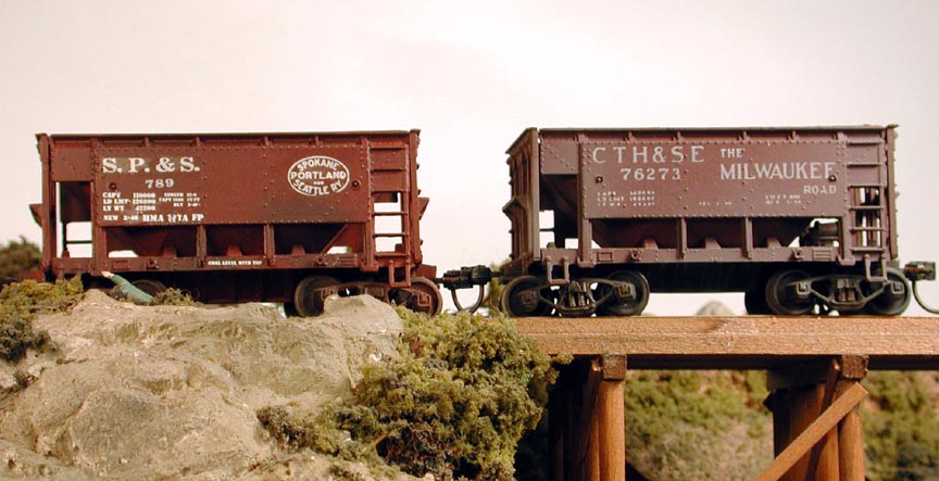 Five Ore Cars from Different Railroads