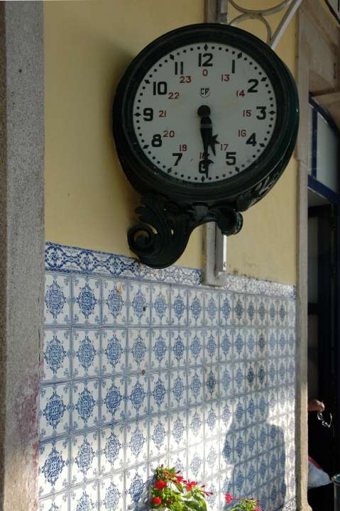 Station clock and tile wall