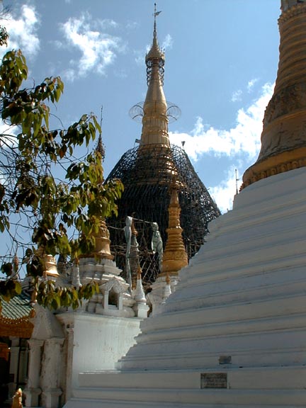 A pagoda under repair covered with bamboo scaffolding