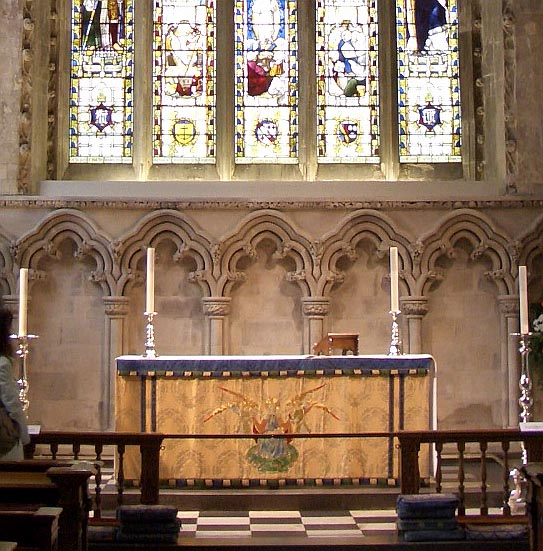 Altar in the Lady Chapel, with Grimthorpe's stained glass window behind