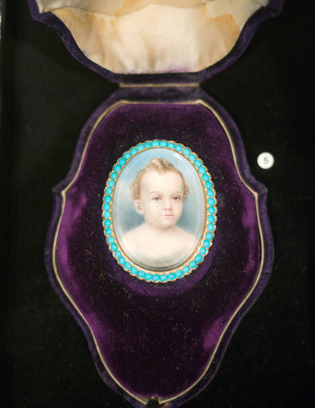 Cased brooch with painted child’s portrait