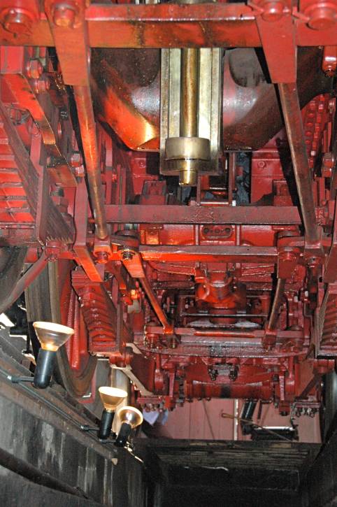 Underneath a steam locomotive