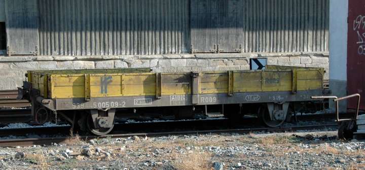 Four-wheel flat car photgraphed alongside the freight house, Pocinho, Portugal