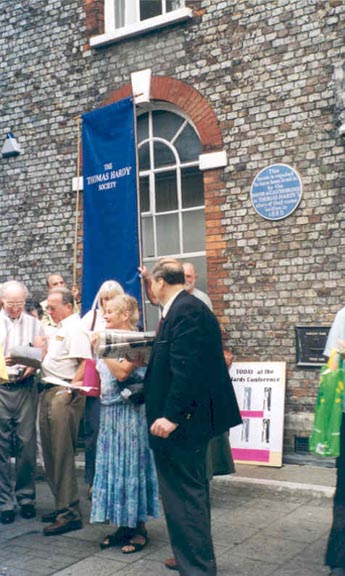 SThe Thomas Hardy Society reading from Hardy's poems in front of the Dorchester house