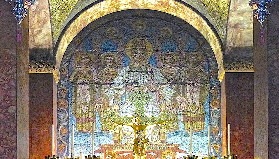 Filigree cross against mosaic
