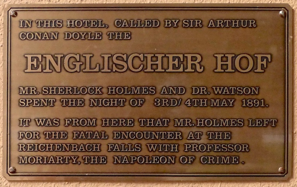 Plaque by the hotel's entrance