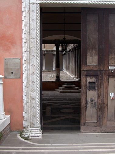 View of courtyard through open doorway